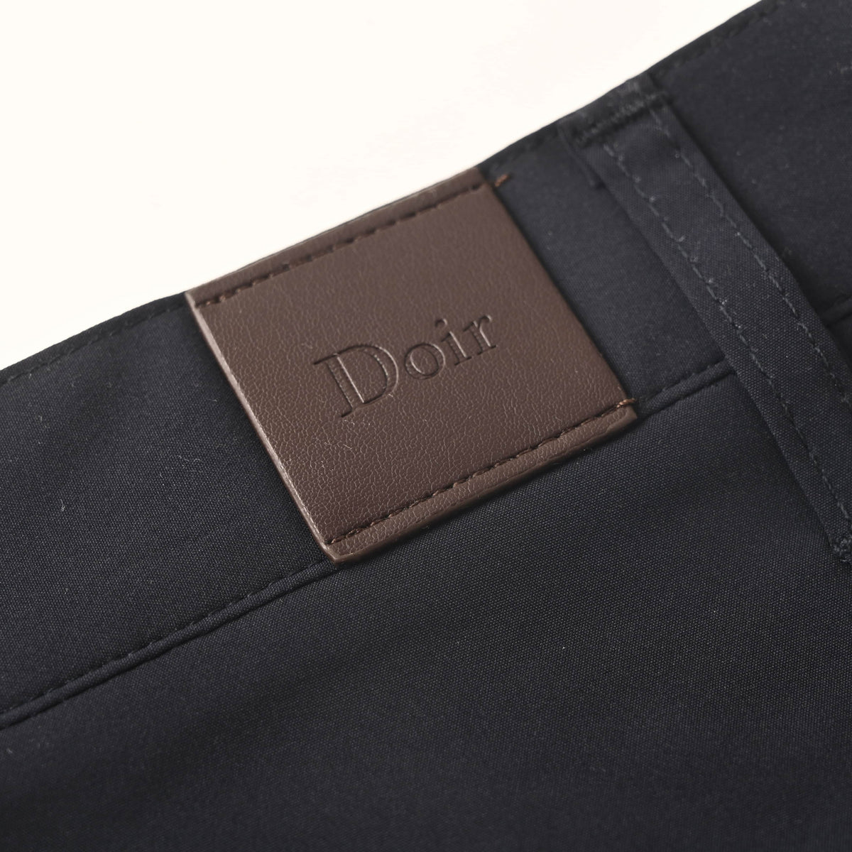 Christian Dior CD Letter Embroidered Utility Pants with Button Details for Workwear-Inspired Streetwear