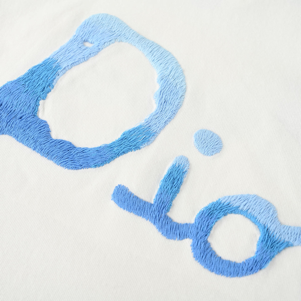 Christian Dior Blue Gradient Graffiti Embroidered T-Shirt with Front and Back Artwork for Statement Streetwear