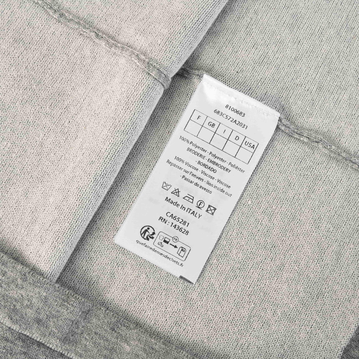 Christian Dior Small Logo Knit T-Shirt with Drop Shoulders and Short Sleeves for Minimalist Styling