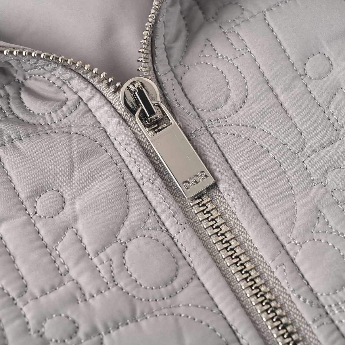 Christian Dior CD Chest Detail Quilted Zip-Up Jacket, Embossed Hooded Outerwear for Casual Streetwear